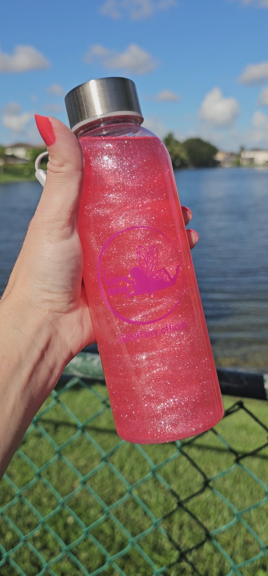 PLUR fairy dust sparkling in branded water bottle